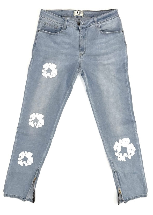 Jean flare à zip cheville motif fleurs